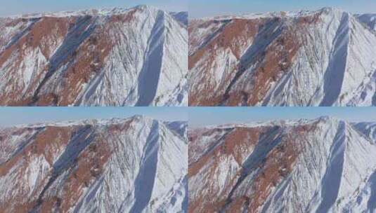 航拍新疆冬季安集海大峡谷红色山脉雪山高清在线视频素材下载
