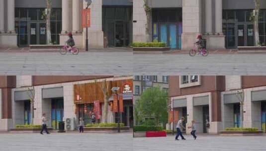 外国小孩在广场上玩耍骑车1高清在线视频素材下载