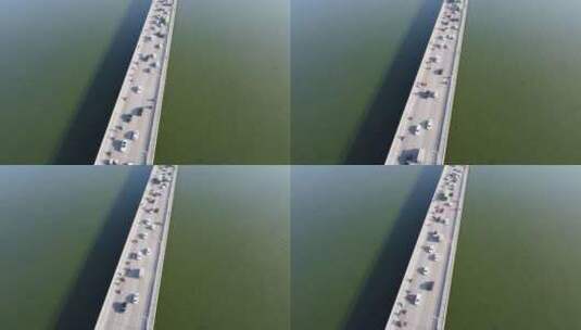 俯视大桥车流河面高清在线视频素材下载