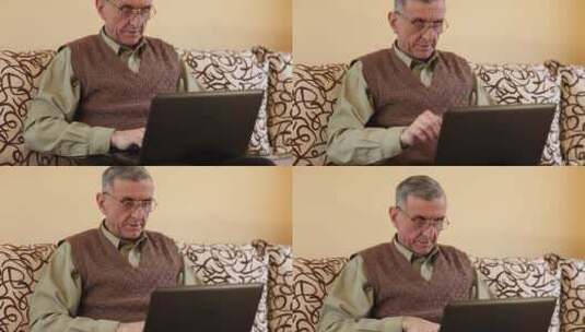 老人用笔记本电脑打短信高清在线视频素材下载