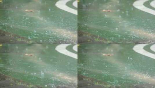 雨落在地面上的特写镜头高清在线视频素材下载