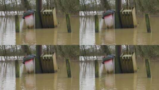 村庄里被洪水淹没的垃圾箱高清在线视频素材下载