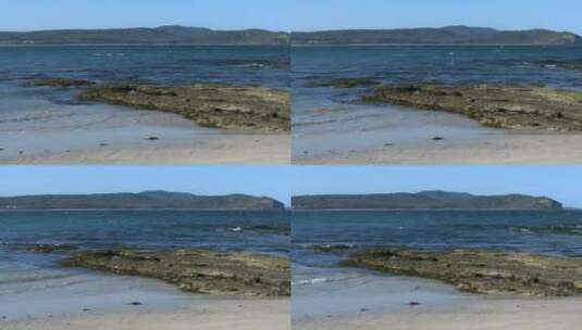 海滩和裸露的岩石景观高清在线视频素材下载