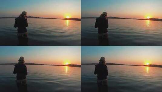 日落时女孩钓鱼高清在线视频素材下载