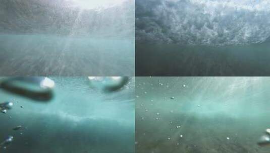 极速慢动作（240英尺/秒）水下视图，从波浪下方拍摄的岸边波浪。高清在线视频素材下载