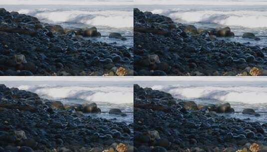 巨浪拍打着鹅卵石海滩高清在线视频素材下载