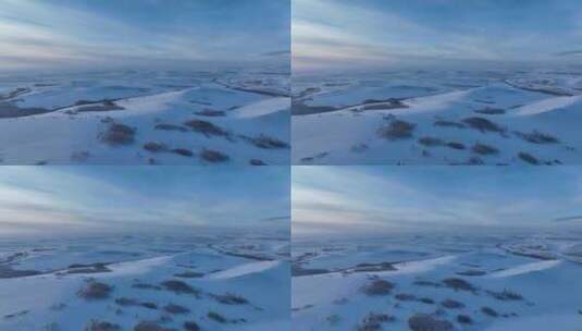 航拍严冬中的白雪皑皑的雪原暮色高清在线视频素材下载