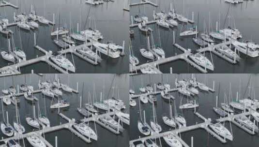 一群人乘坐帆船到达庞恰特雷恩湖码头。-空中高清在线视频素材下载