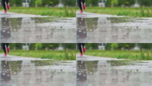 下雨天跑步的步伐特写高清在线视频素材下载