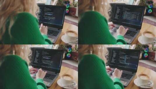 自由职业者程序员和数据科学家女性在展示的咖啡厅视图中使用笔记本电脑高清在线视频素材下载