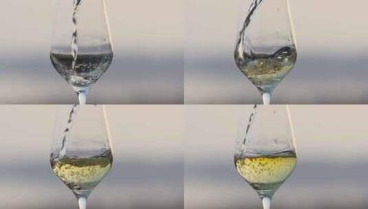 把酒倒进杯子里 香槟 白葡萄酒高清在线视频素材下载