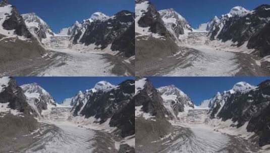 从上面见证白雪覆盖的山峰中令人惊叹的冰川高清在线视频素材下载