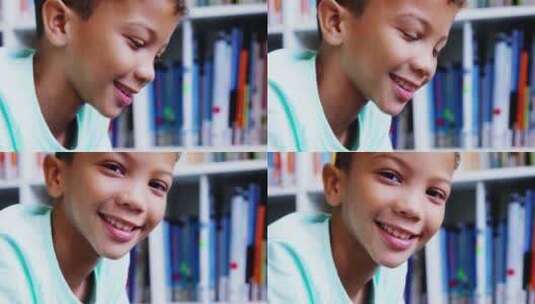 学校图书馆男生微笑的肖像高清在线视频素材下载