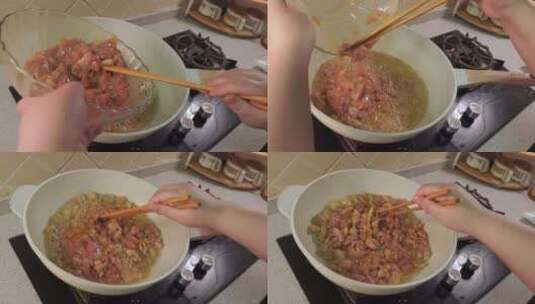 热锅热油下入腌制的鸡丁高清在线视频素材下载