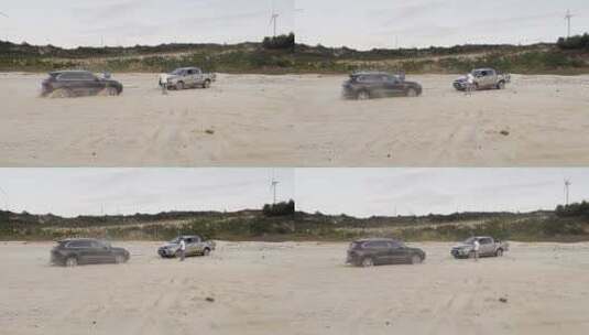 小汽车陷入沙滩泥沙中救援车绞盘脱困视频高清在线视频素材下载
