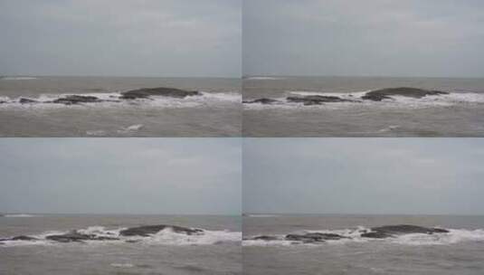 阴天大海礁石海岸边海水海边岩石大海上礁石高清在线视频素材下载