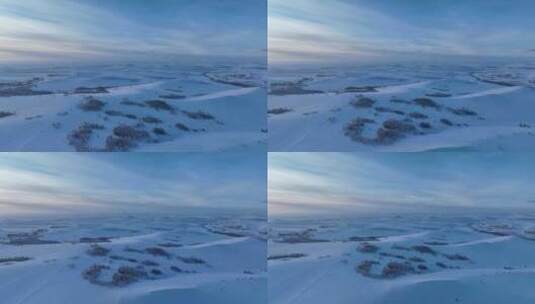 航拍严冬中的白雪皑皑的雪原暮色高清在线视频素材下载