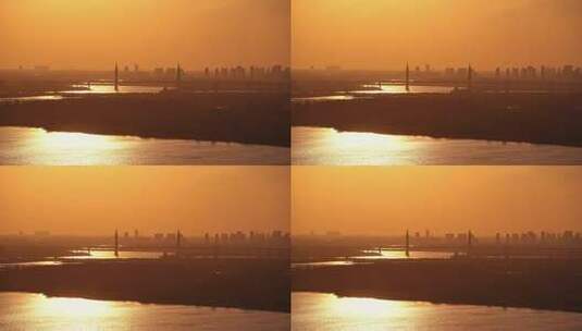 中国哈尔滨阳明滩大桥日落夕阳风光高清在线视频素材下载