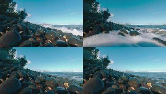 浪涌翻滚的黑色鹅卵石海滩高清在线视频素材下载