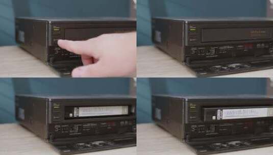 男人按下按钮从VHS播放器中取出带有标签机密磁带的旧黑色磁带高清在线视频素材下载