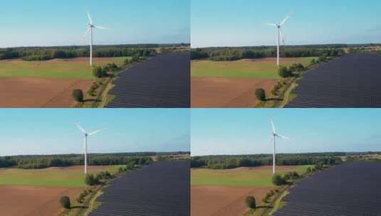 田野的风车和太阳能板高清在线视频素材下载
