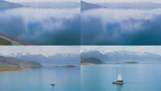 4K航拍新疆赛里木湖的行船行驶中高清在线视频素材下载