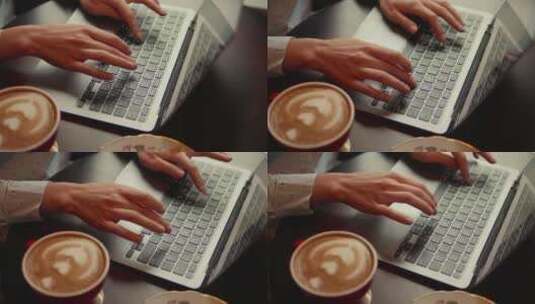 咖啡馆里在笔记本电脑上打字的女人高清在线视频素材下载