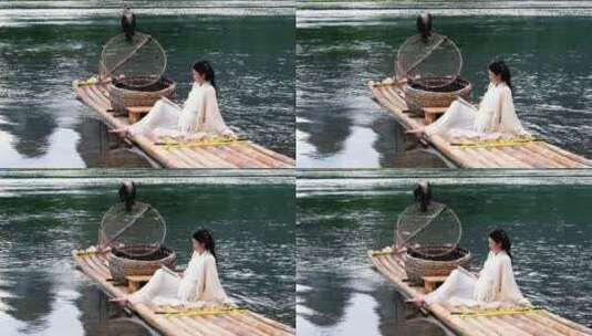 桂林山水漓江竹筏上的古风汉服美女背影高清在线视频素材下载