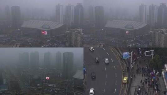 俯拍武汉光谷广场雨天雾天人流车流 组镜高清在线视频素材下载