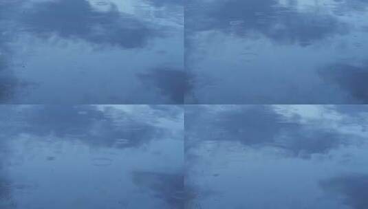 雨水落在蓝色水面上高清在线视频素材下载