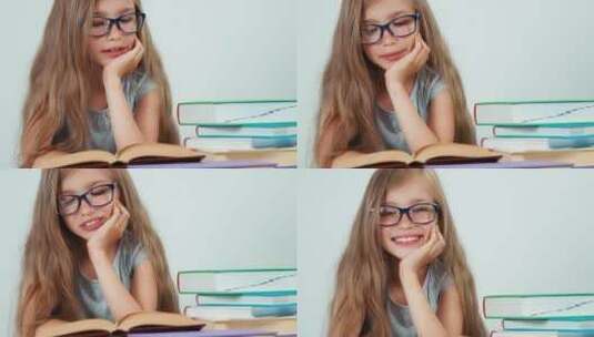女孩在开心的阅读故事书高清在线视频素材下载