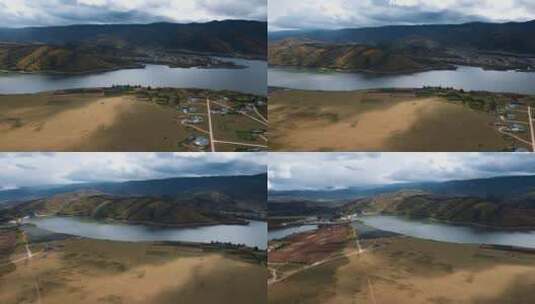 草原牧场视频云南香格里拉藏区藏族民房湖泊高清在线视频素材下载