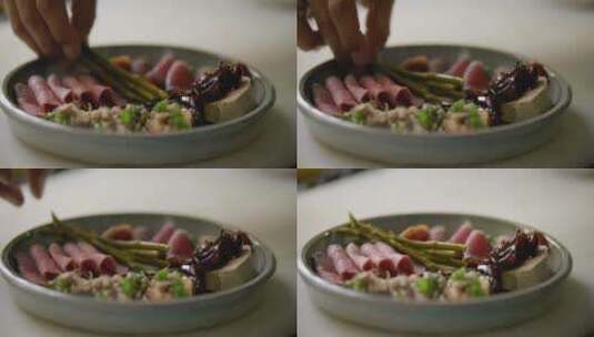 厨师用盘子摆上芦笋高清在线视频素材下载