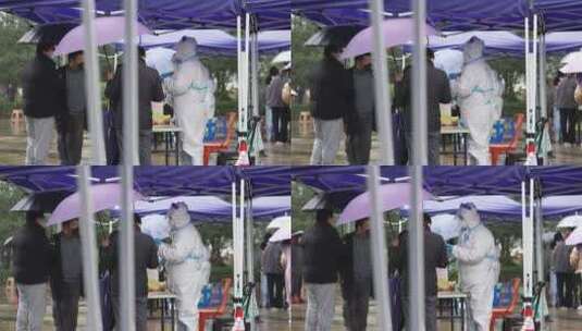 杭州加油滨江区全民冒雨新冠防疫核酸检测高清在线视频素材下载