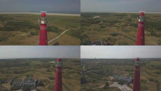 海岸附近的红色灯塔_旋转的航拍高清在线视频素材下载