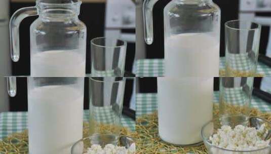天然乳制品。牛奶罐、玻璃罐和带勺子的奶酪高清在线视频素材下载
