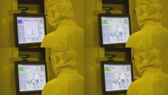 芯片制造黄色环境下工程师进行测试实验高清在线视频素材下载
