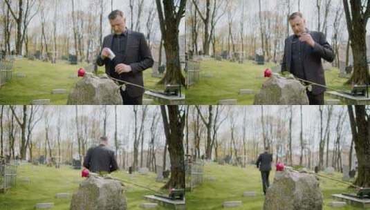 站在墓碑前悲伤的男人高清在线视频素材下载