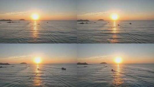4k海南万宁乌场渔港灯塔渔船海上日出航拍高清在线视频素材下载