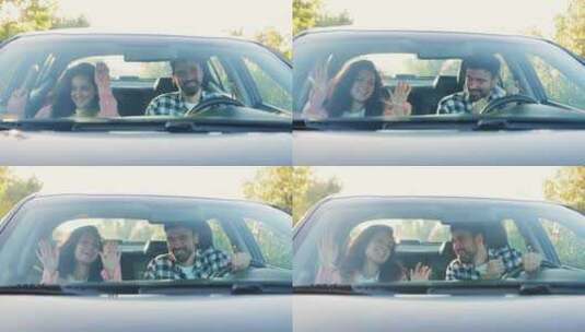 快乐的夫妇在车里开慢动作派对高清在线视频素材下载