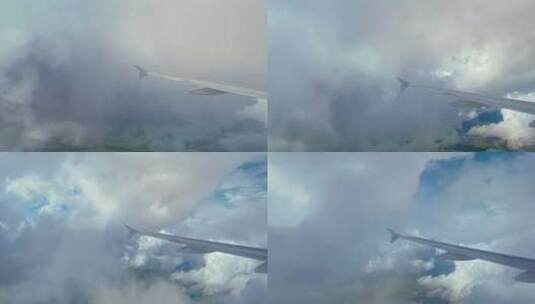 飞机飞行。穿过云层的飞机机翼高清在线视频素材下载