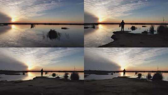 乌梁素海夕阳下人物剪影高清在线视频素材下载