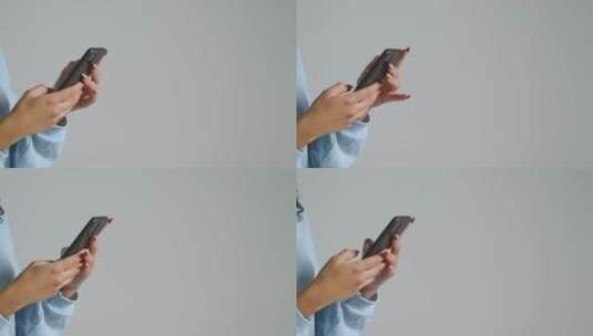 女性玩手机的手的侧面轮廓高清在线视频素材下载