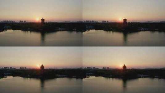 东莞航拍华阳湖湿地公园华阳塔日落横移高清在线视频素材下载