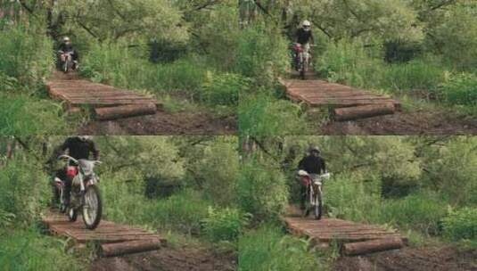两个男人在森林的木桥上骑摩托高清在线视频素材下载