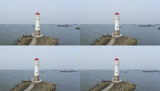 日落海景航拍上海吴淞口灯塔瞭望塔高清在线视频素材下载