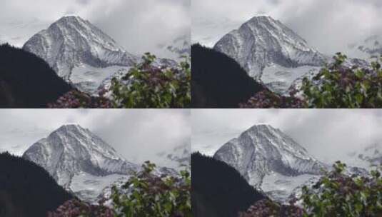 云雾缭绕的雪山景观高清在线视频素材下载