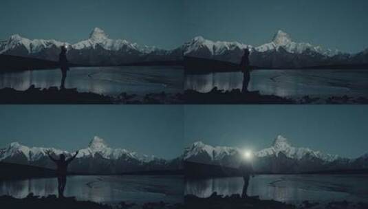 矗立在雪山湖泊美景中高清在线视频素材下载