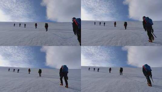 攀登沙鲁里山脉尼登贡嘎雪山冰川上的登山者高清在线视频素材下载