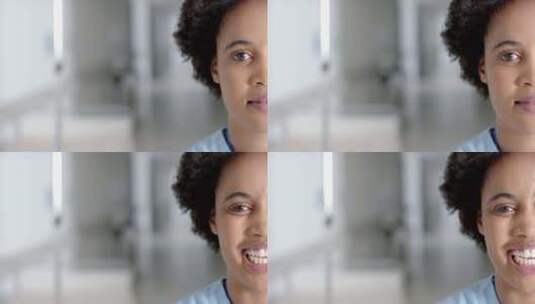 非裔美国护士在明亮的医院走廊上温暖地微笑高清在线视频素材下载